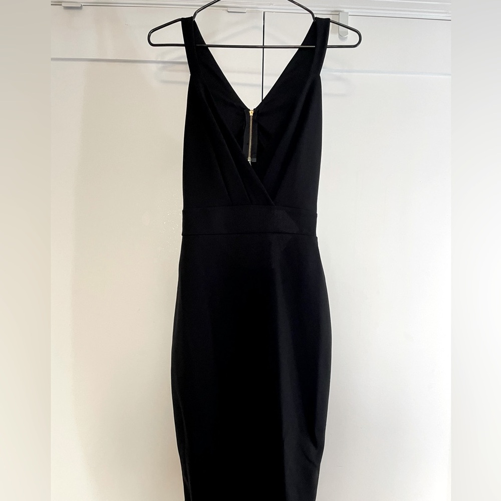 Black Cocktail Dress. Open lower back.